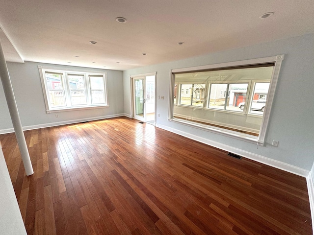 unfurnished room featuring wood-type flooring