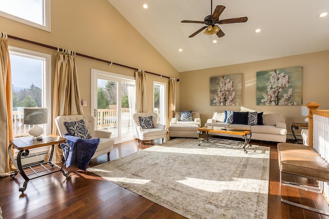 living room featuring ceiling fan, high vaulted ceiling, and wood-type flooring