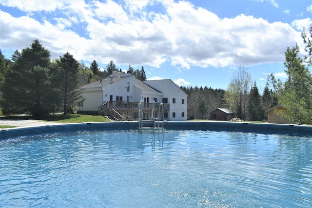 view of pool featuring a deck