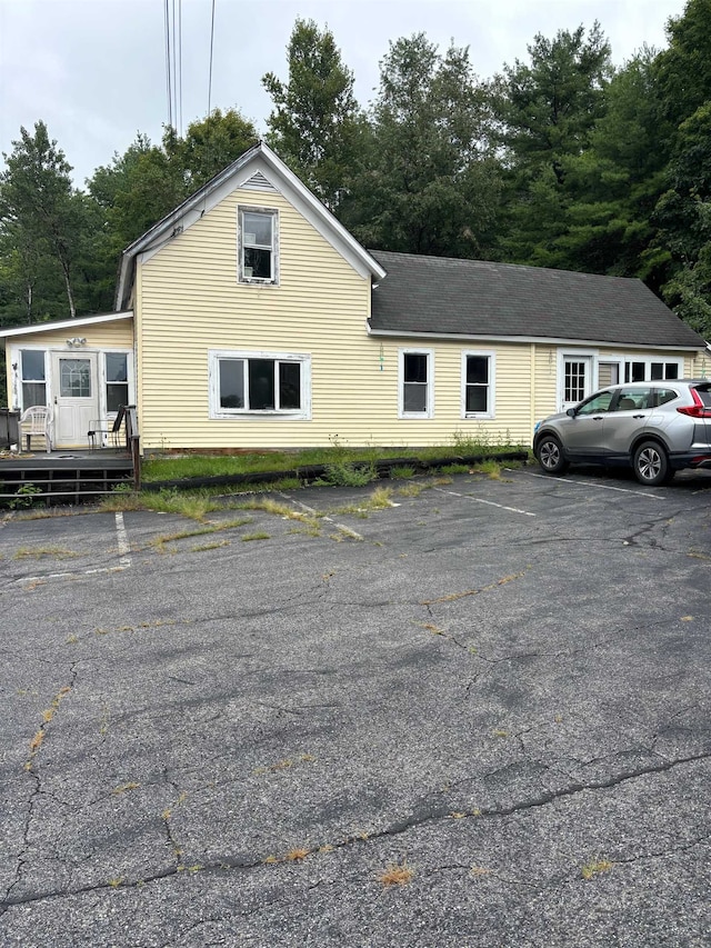 view of front of property featuring a wooden deck