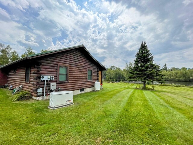 view of home's exterior featuring a lawn