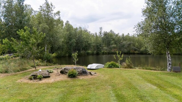 view of yard with a water view