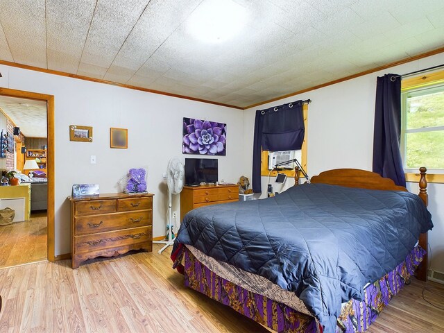 bedroom featuring light hardwood / wood-style flooring