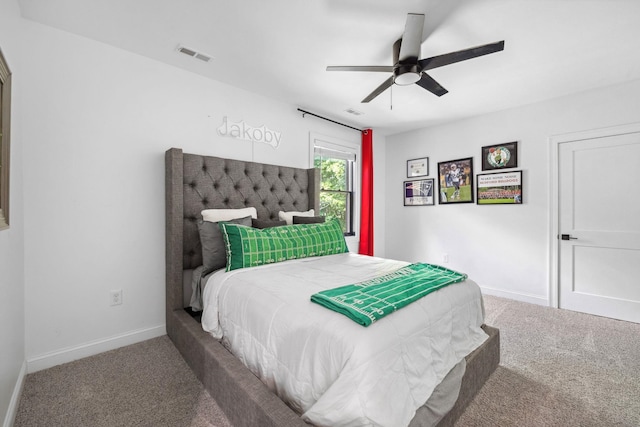 carpeted bedroom featuring ceiling fan