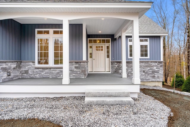 doorway to property featuring a porch