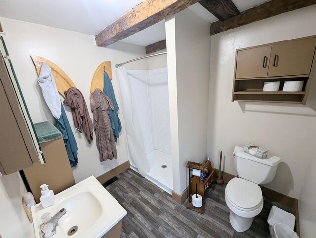 2454 W Barnet Rd, Barnet, VT 05821 - full bathroom with a sink, beamed ceiling, wood finished floors, a stall shower, and toilet