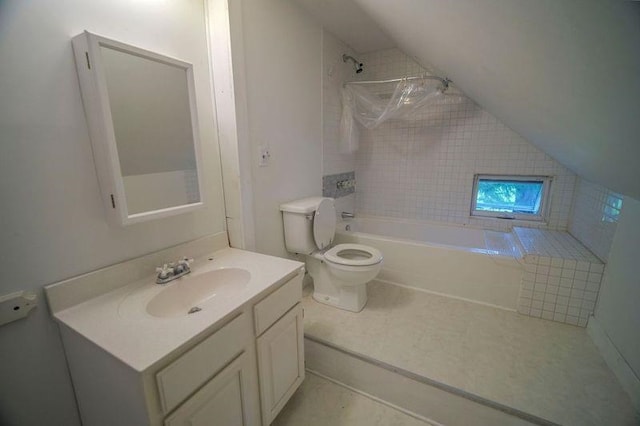 full bath with lofted ceiling, toilet, vanity, shower / tub combination, and tile patterned floors