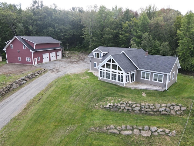 bird's eye view featuring a view of trees