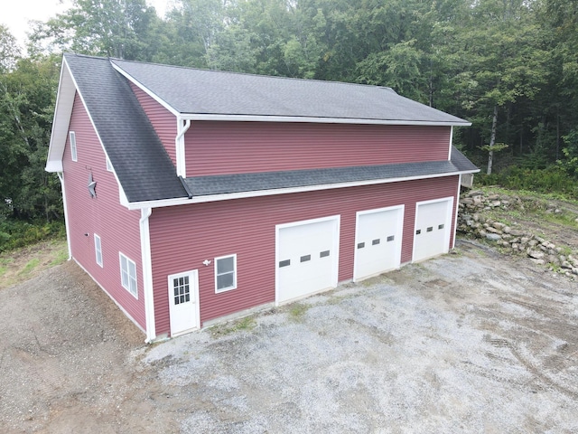 garage featuring driveway