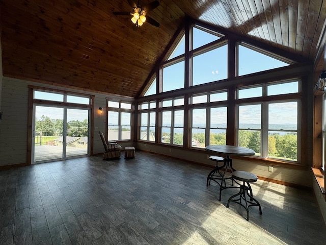 unfurnished sunroom featuring lofted ceiling, wooden ceiling, and ceiling fan