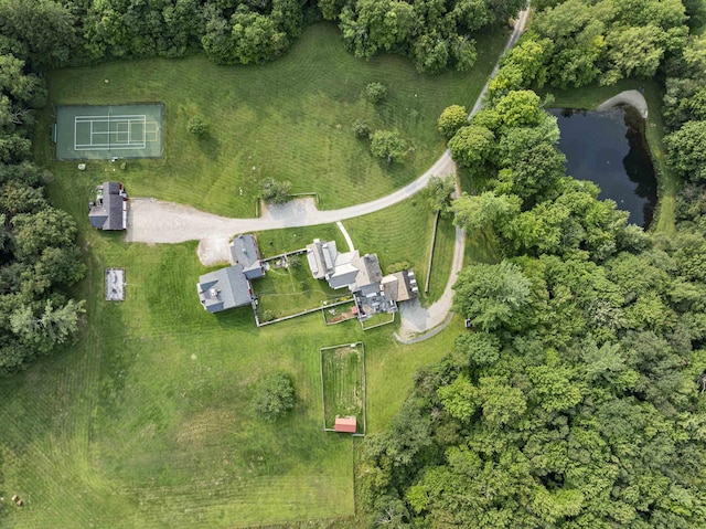 bird's eye view with a water view
