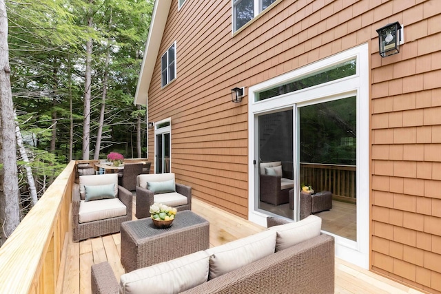 wooden deck with outdoor lounge area