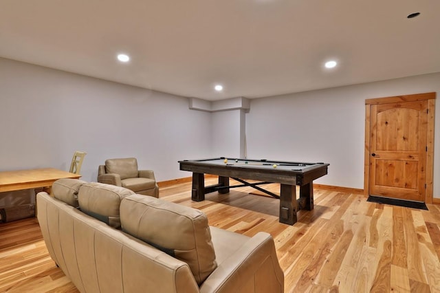 game room featuring light wood-type flooring and recessed lighting