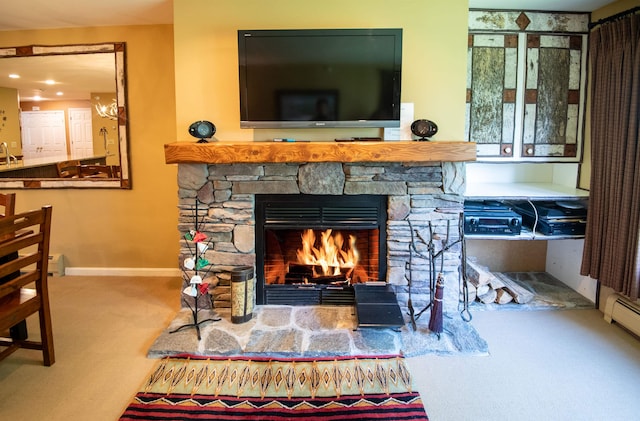 room details with carpet and a fireplace