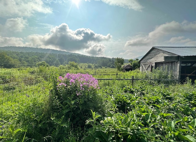 property view of mountains featuring a rural view