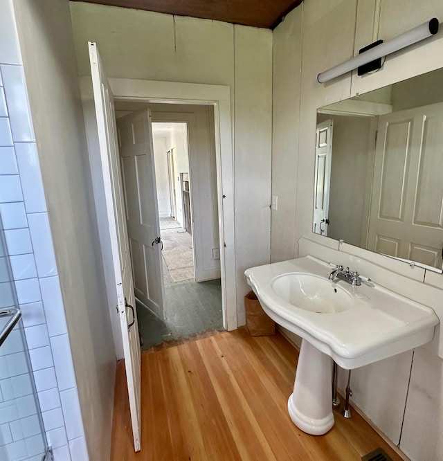 bathroom featuring hardwood / wood-style flooring