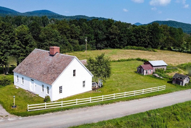 bird's eye view featuring a mountain view and a rural view