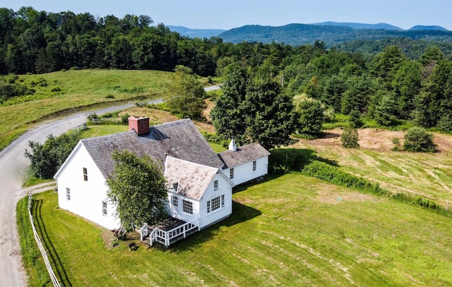 birds eye view of property with a mountain view