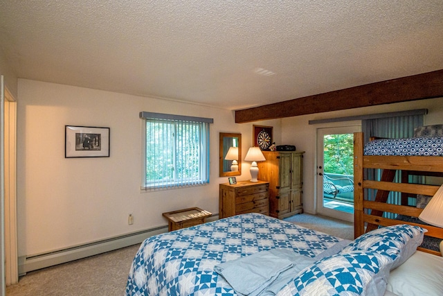 carpeted bedroom with a baseboard radiator, a textured ceiling, and access to outside