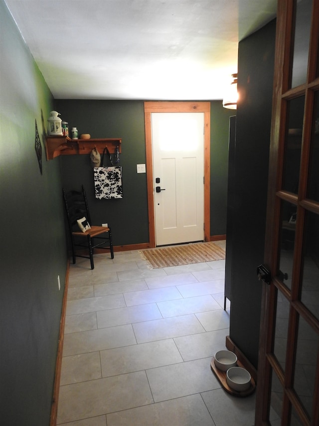 interior space with light tile patterned floors