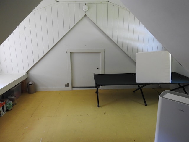 office area with vaulted ceiling