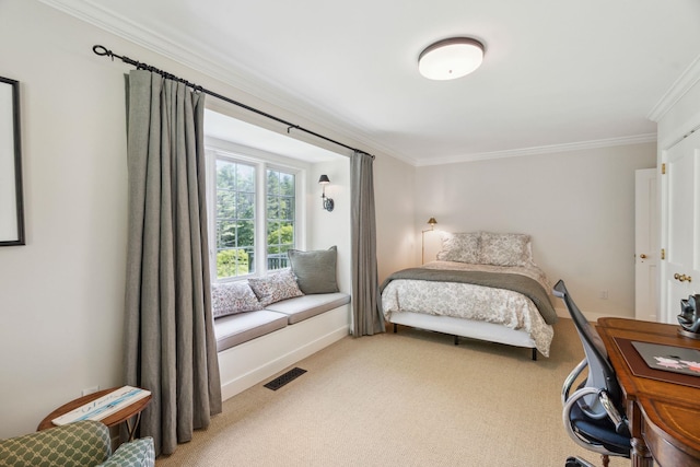 bedroom featuring carpet floors and ornamental molding