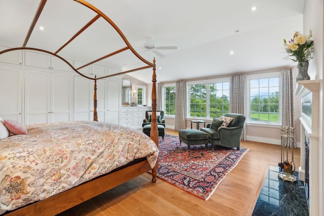 bedroom featuring light hardwood / wood-style flooring and ceiling fan