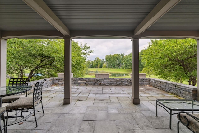 view of patio / terrace featuring a water view