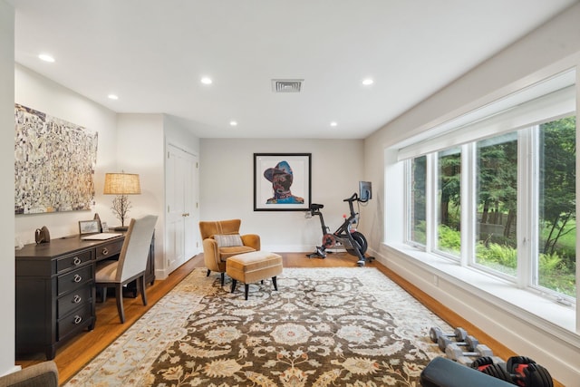 office area with hardwood / wood-style floors