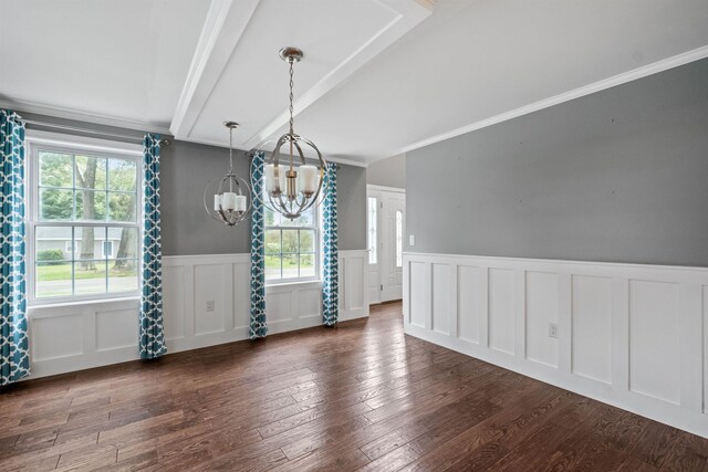 unfurnished dining area featuring crown molding, dark hardwood / wood-style flooring, and a notable chandelier