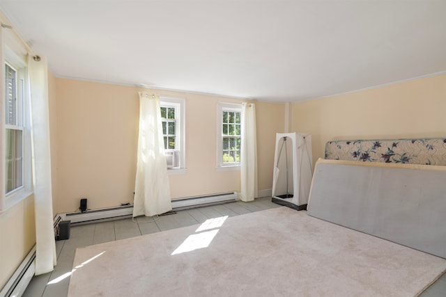 interior space featuring light tile patterned floors and baseboard heating