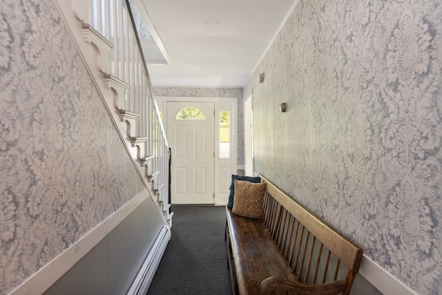 entryway featuring dark carpet