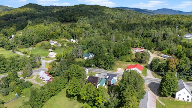 drone / aerial view featuring a mountain view