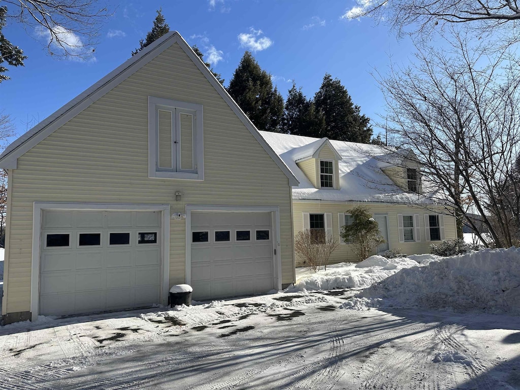 exterior space with a garage