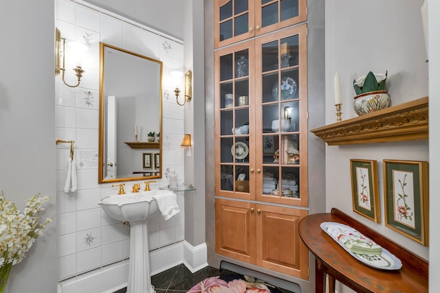 bathroom featuring tile walls and tile patterned floors