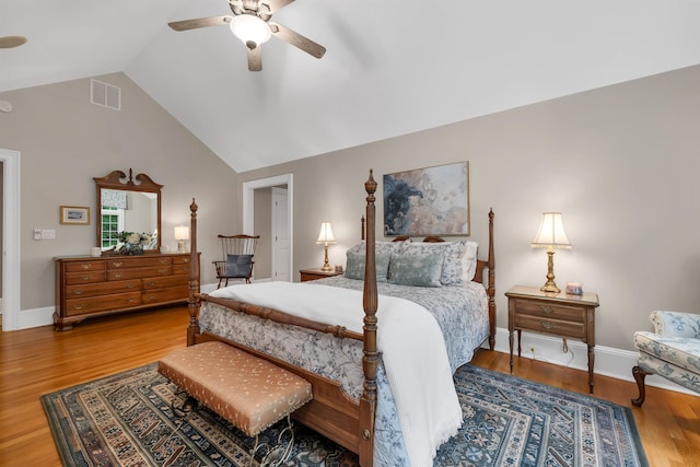 bedroom with lofted ceiling, ceiling fan, and light hardwood / wood-style floors