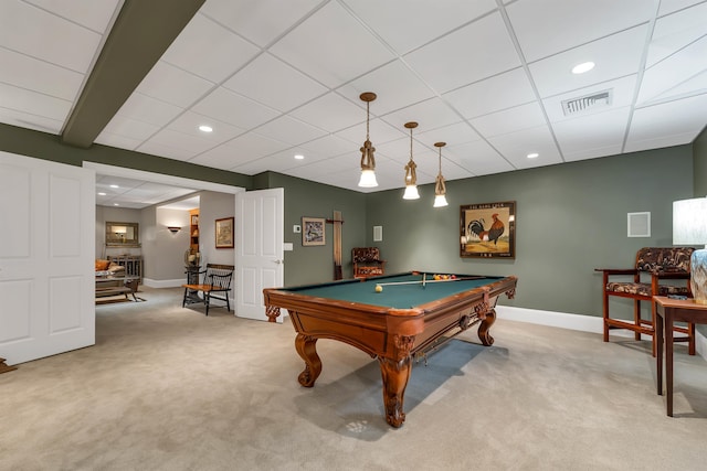 recreation room with a paneled ceiling, pool table, and light carpet