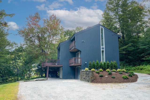 view of property exterior featuring a balcony