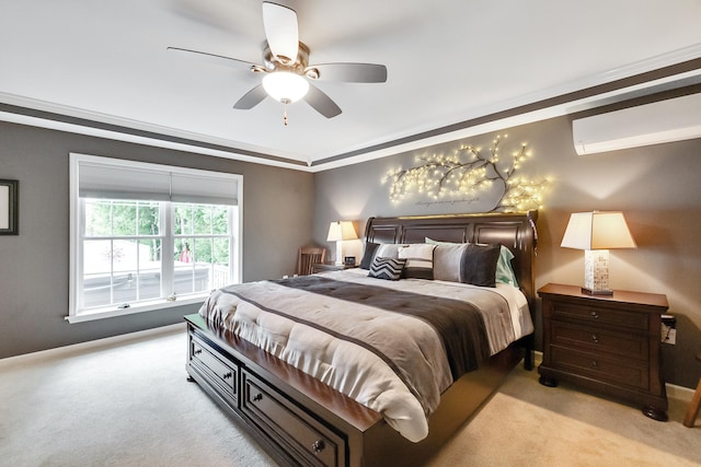 carpeted bedroom with a wall unit AC and ceiling fan