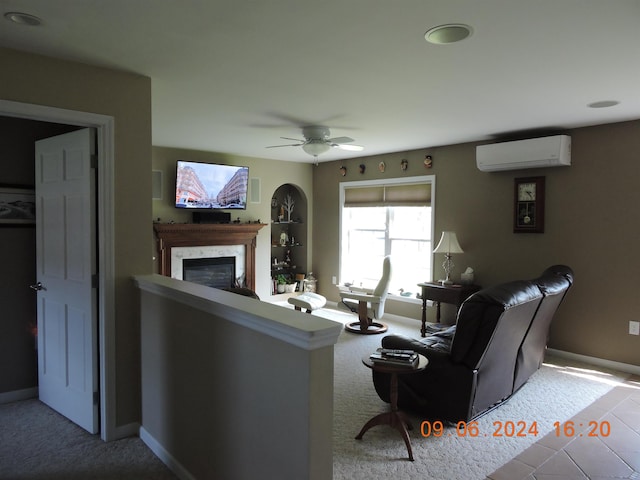 carpeted living room featuring ceiling fan, a wall unit AC, and a premium fireplace