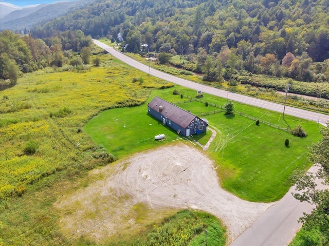 birds eye view of property featuring a rural view