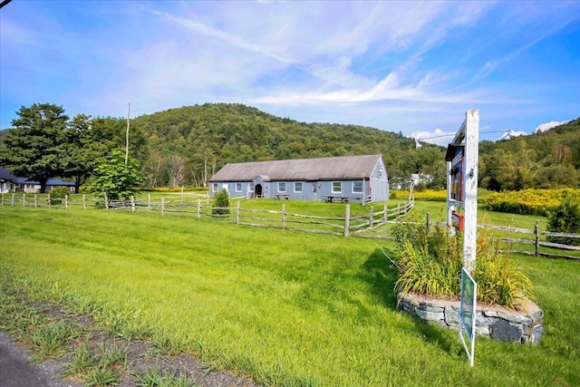 exterior space featuring a mountain view and a rural view