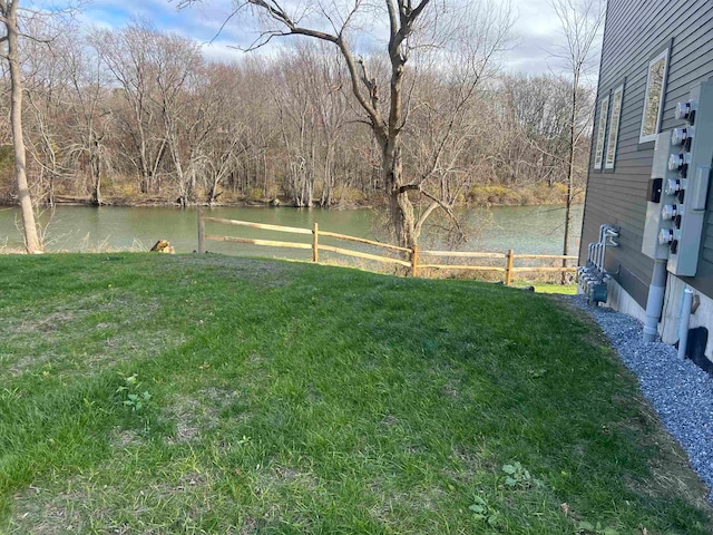 view of yard with a water view