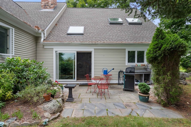 rear view of property with a patio