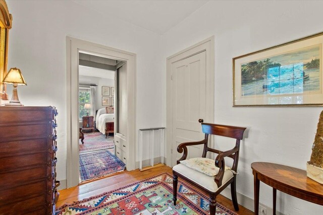 sitting room with light hardwood / wood-style flooring