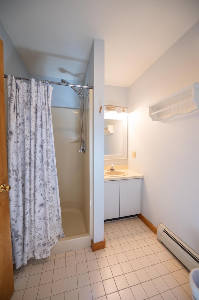 bathroom featuring vanity, a shower with shower curtain, baseboards, a baseboard radiator, and tile patterned floors