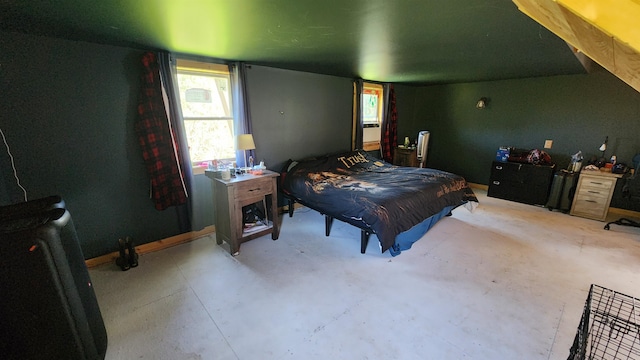 bedroom with concrete floors