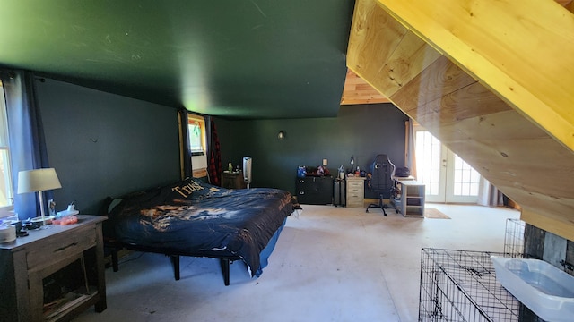 bedroom with concrete floors