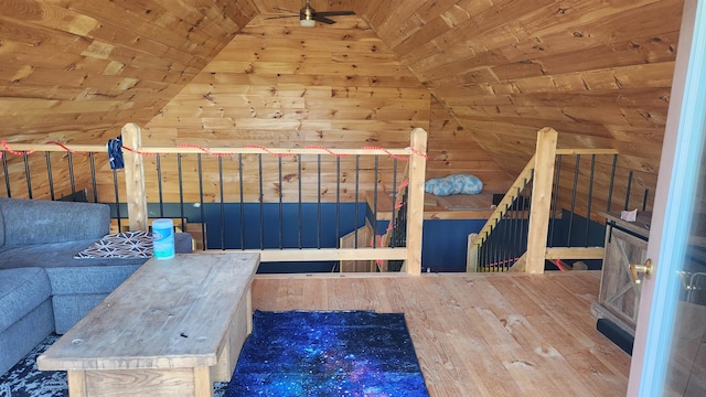 interior space with lofted ceiling, hardwood / wood-style floors, and wooden ceiling