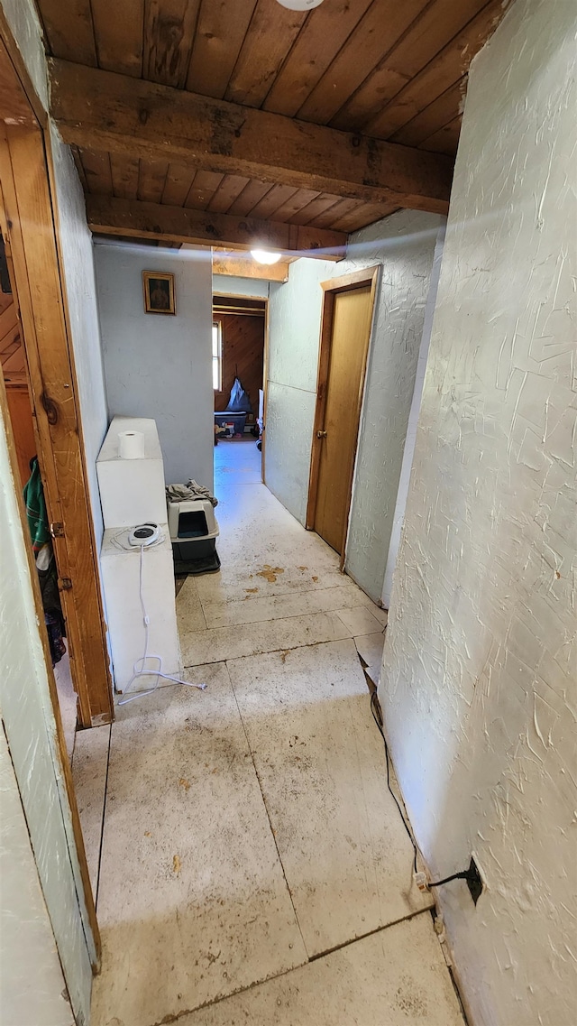 corridor featuring beam ceiling and wooden ceiling